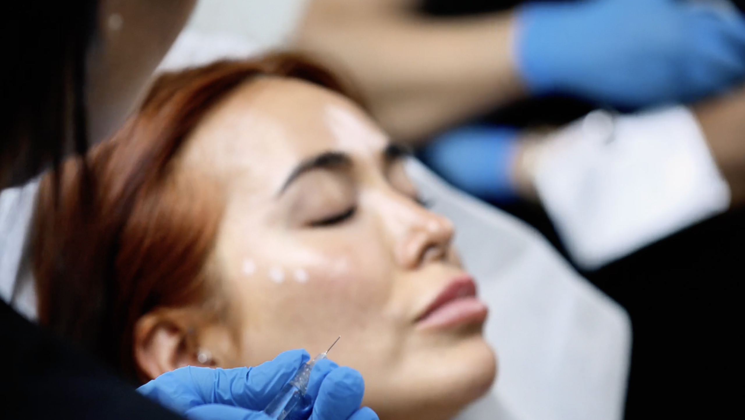 Aesthetic facial treatment during a live V-Line training session